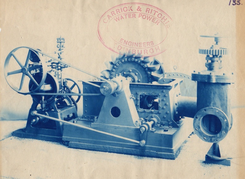 A Pelton water wheel turbine with a Woodward compensating type governor.jpg